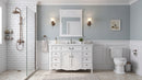 Chans Furniture Rocaille Victorian bathroom vanity, white with a distressed finish, single sink, mirror, blue-gray room