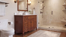 Antique brown Rocaille Victorian bathroom vanity, angle view in a bathroom with a mirror and walk-in shower