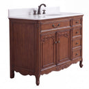 Antique brown Rocaille Victorian bathroom vanity with white quartz top, angle view